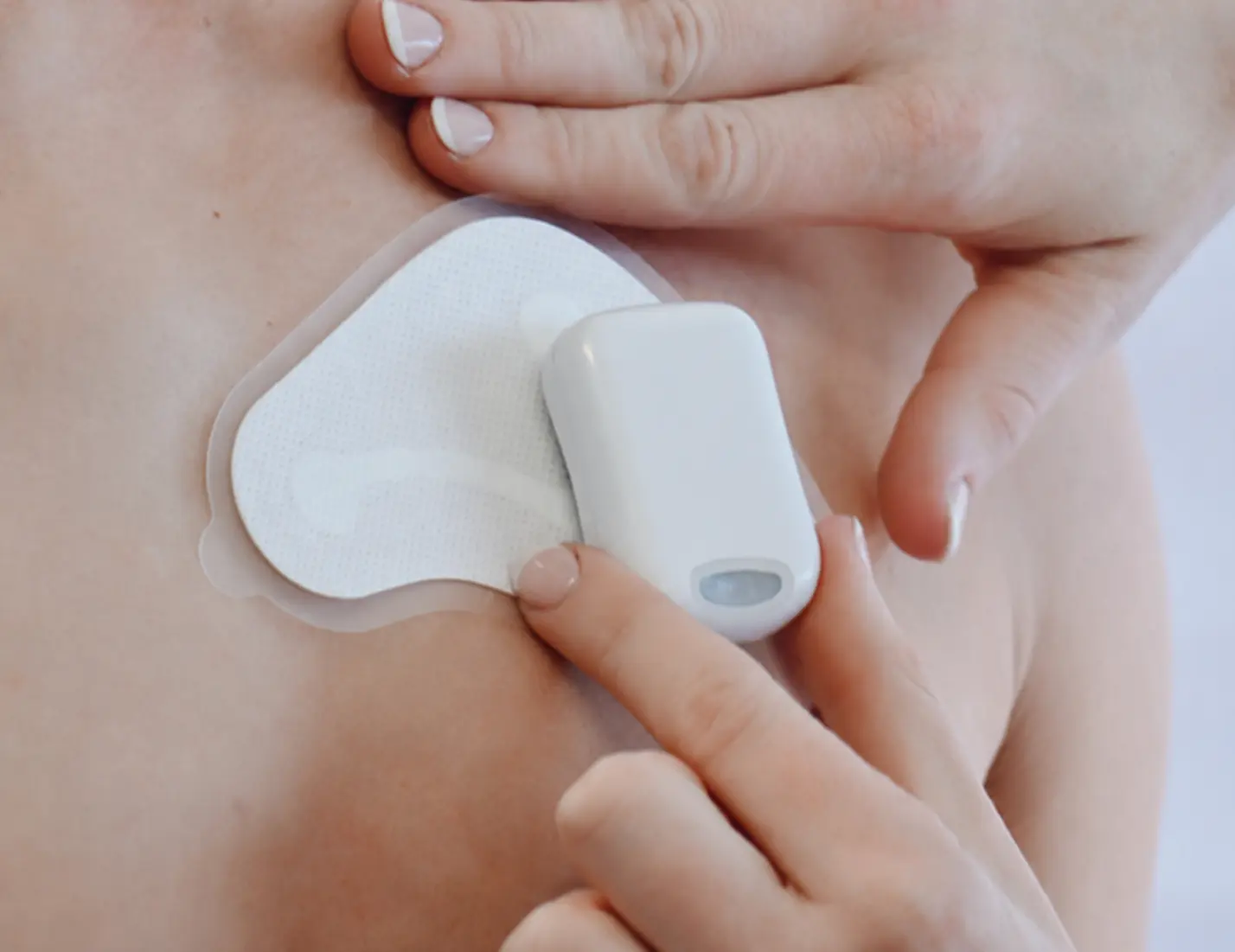A patch Holter monitor: a small ECG recorder set within an adhesive patch attached to the chest, worn for 24 hours